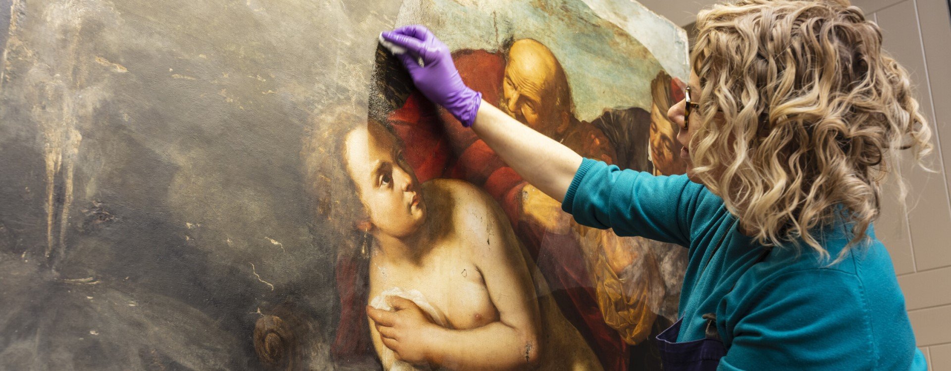 A conservator works on 'Susanna and the Elders' by Artemisia Gentileschi 