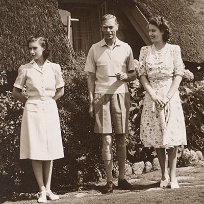 King George VI stands with Princess Elizabeth and Princess Margaret in the Drakensberg National Park. RCIN 2704838. King George VI stands with Princess Elizabeth and Princess Margaret in the Drakensberg National Park. RCIN 2704838.