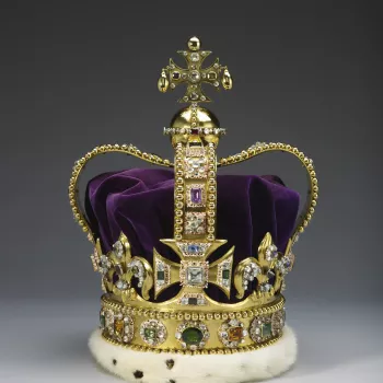 The crown is composed of a solid gold frame, set with tourmalines, white and yellow topazes, rubies, amethysts, sapphires, garnet, peridot, zircons, spinel, and aquamarines, step-cut and rose-cut and mounted in enamelled gold collets, and with a velvet ca