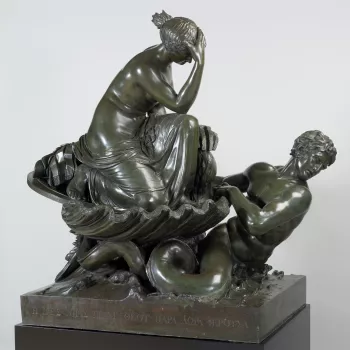 A bronze group of Thetis, partly draped and wearing sandals, her hand to her head, crouched in a large scallop shell, and carrying the newly-created armour of Achilles (sword, helmet, cuirass and greaves); the shell is borne by a double-tailed triton risi
