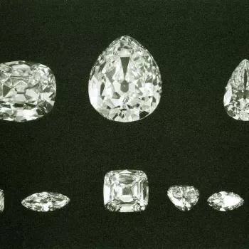 Photograph of the nine complete diamonds cleft from the Cullinan Diamond.
Cullinan I and II, the two largest cut diamonds, were reserved for King Edward and in 1909 they were temporarily mounted as a somewhat oversized pendant brooch. After Edward VII's 
