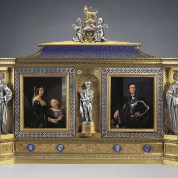 This jewel cabinet is a proud dynastic statement incorporating the Queen&rsquo;s favourite image of the Prince, the Royal and Saxe-Coburg arms, and portraits of their six children born before 1851. Designed in the form of a large reliquary, the cabinet wa