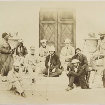 Photograph showing a group of eleven men including the Prince of Wales, later King Edward VII, seated and standing around a low set of steps. The photograph was taken in Cairo in March 1862 during the tour of the East made by the Prince of Wales. The Prin
