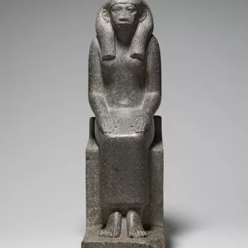 Black granite statue of Queen Senet, consort and mother of two as yet unidentified pharaohs of the XII Dynasty (c.1985–1785 BC). She is depicted seated on a throne with her hands resting on her thighs, palms down, fingers outstretched, and wearing a str