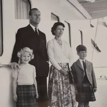 The Royal Family stood on the deck of the Royal yacht
