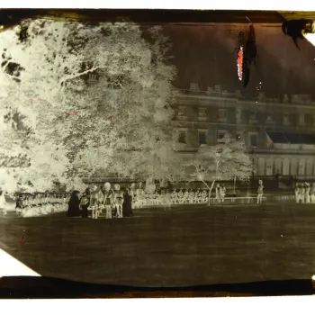 4 &frac34;" x 6.5" glass plate negative showing Queen Victoria meeting wounded Crimean War veterans in the gardens of Buckingham Palace. The Queen and members of the Royal family are standing in a small group to the&nbsp;left with a number of the veterans