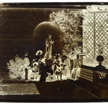 Glass plate of the Royal Family on the terrace at Osborne. From right to left: Prince Alfred, Prince Albert, Princess Helena, Princess Alice, Prince Arthur, Queen Victoria holding Princess Beatrice, Princess Royal, Princess Louise, Prince Leopold and Albe
