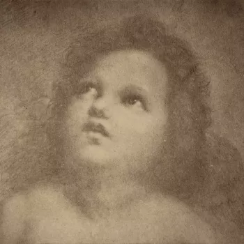 Photograph of a drawing of&nbsp;an&nbsp;angel, or putti, by Raphael (1483-1520). The putti is depicted in a head and shoulder length portrait. He gazes upwards, his chin raised.