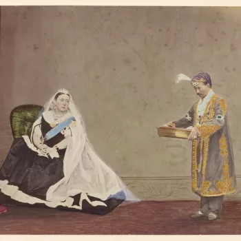 Composite photograph of Queen Victoria (1819-1901) and Prabhu Narayan Singh, Maharajah of Benares (1855-1931). The Maharajah presents Queen Victoria with a photograph album. The print is inspired by an earlier composite photograph which depicts the Mahara