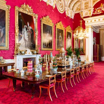 The State Dining Room table at Buckingham Palace laid for a banquet