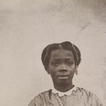 Portrait photograph showing a young lady in Victorian dress