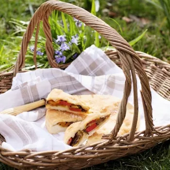 Image of grilled vegetable focaccia in a picnic basket