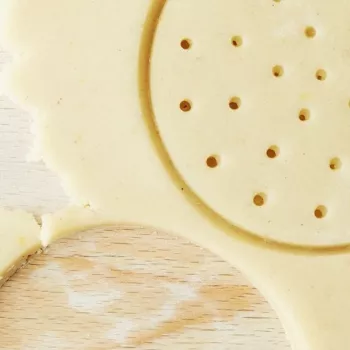 detail of a picture showing shortbread being cut out