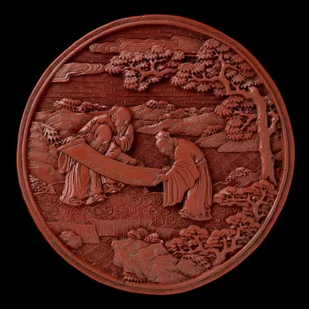 Pair of circular two-tiered carved red lacquer boxes and covers, straight-sided and flat-based, with flanged rim for the tier above. On the top of RCIN 3306.1, a scholar with an attendant holding a spray and a basket filled with lingzhi, approached by an 