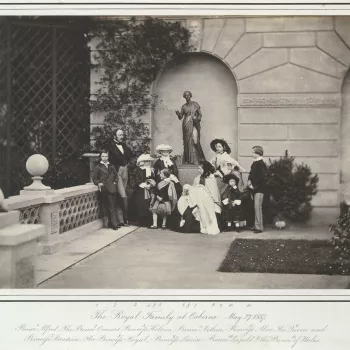 Photograph of The Royal Family on the terrace at Osborne. From left to right:&nbsp;&nbsp;Prince Alfred, Prince Albert, Princess Helena, Princess Alice, Prince Arthur, Queen Victoria holding Princess Beatrice, Princess Royal, Princess Louise, Prince Leopol