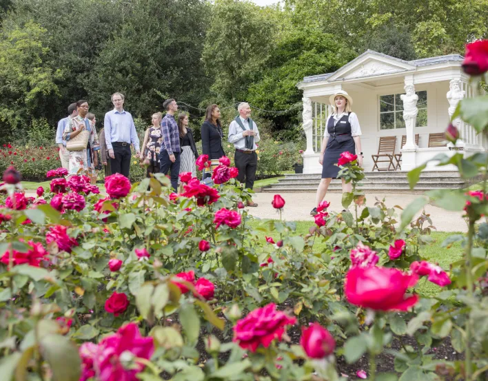 Visitors on a tour of the garden of Buckingham Palace