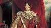George IV stands wearing red coronation robes