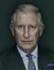Photo of King Charles III wearing suit facing the camera
