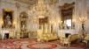White and golden coloured richly furnished drawing room